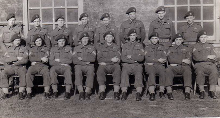 Glider Regiment Photo Top Row - Austin, Barker, Billinge, Davidson, East, Fairgrieve, Lt Hanson, Howard. Bottom Row - Legrande, Lewis, Lovett, Martin, Pitcock, Richards, Redknap, Wallwork, Wilson